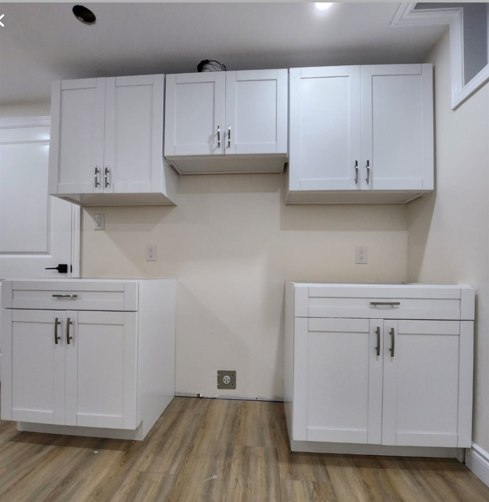 Compact white cabinet installation