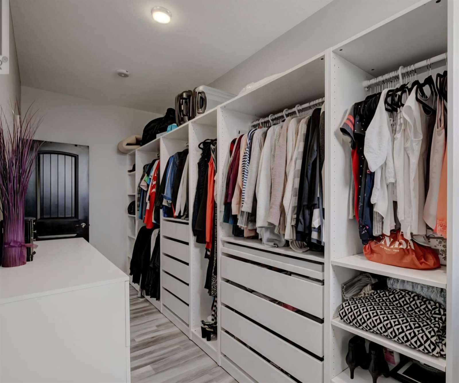Custom closet cabinet storage with drawers and shelves