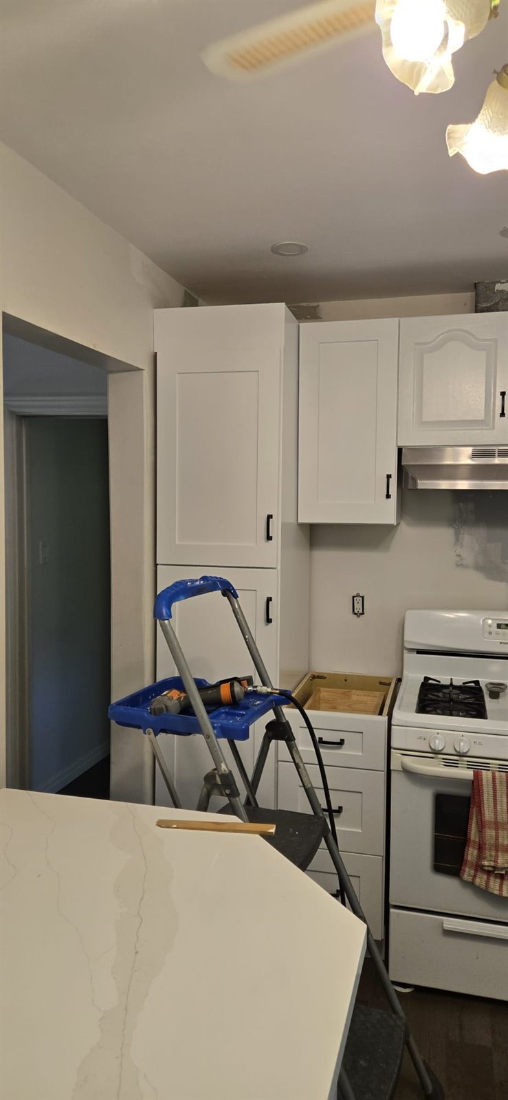 Kitchen cabinet worksite during installation