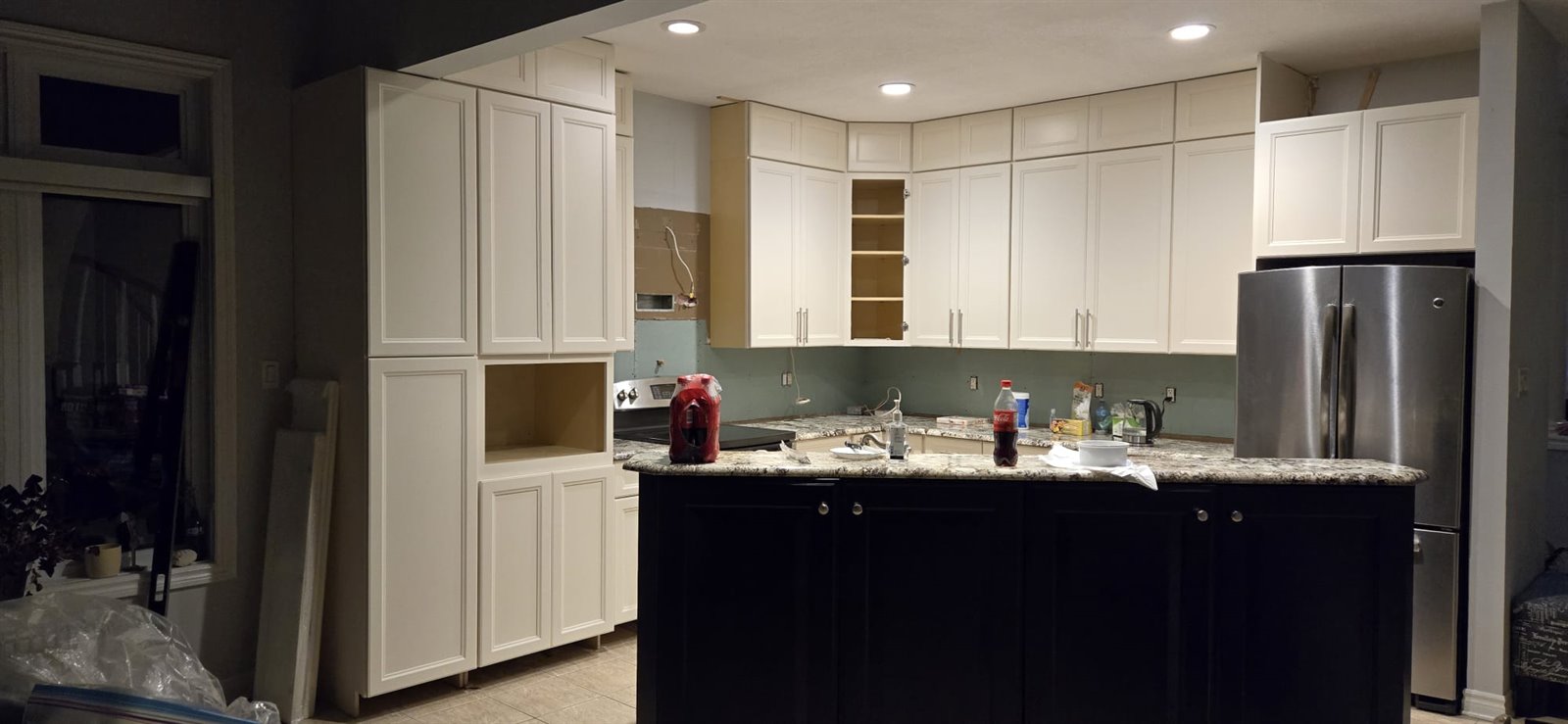 Kitchen cabinets with dark island