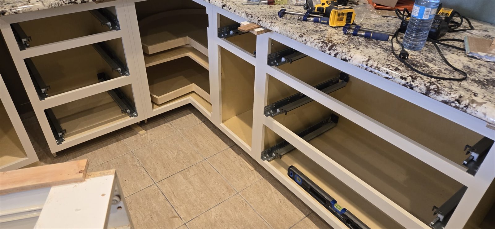 Lower cabinet installation in progress