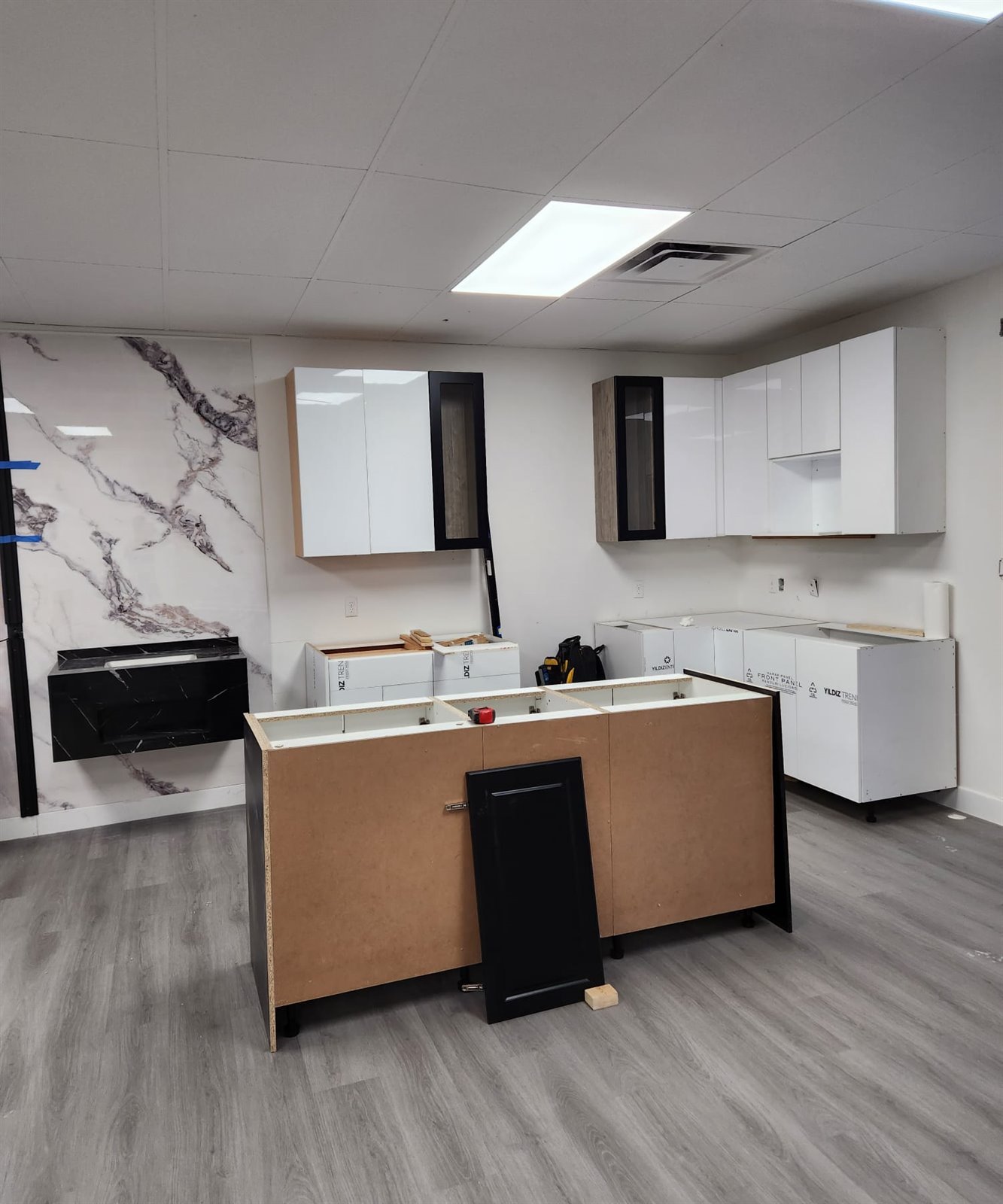 Modern grey kitchen cabinets with island