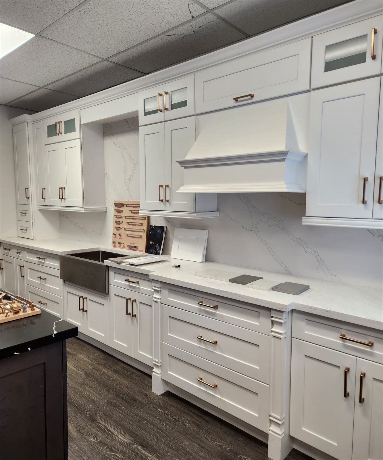 White display kitchen cabinets with range hood