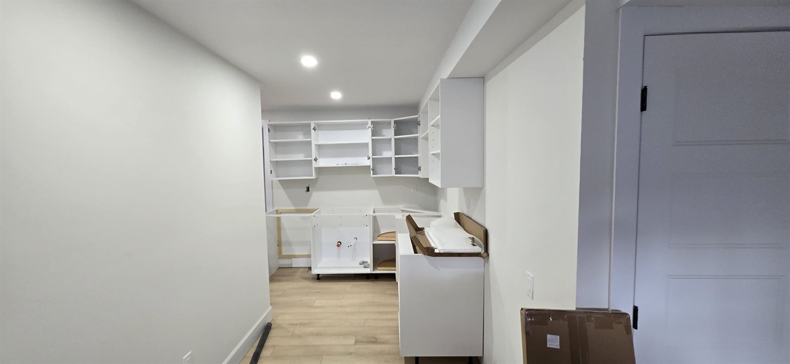 White kitchen cabinet runner view
